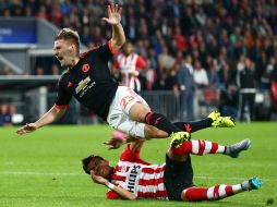 El mexicano Héctor Moreno barrió al ofensivo de los Red Devils. AP / P. Dejong