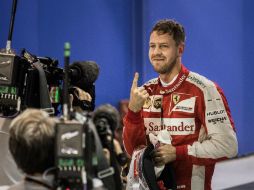 Vettel, de 28 años, logra su primera ''pole'' de la temporada, la cuadragésima sexta en Fórmula Uno. AFP / P. López