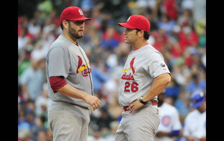 El manager Mike Matheny (26), ha comandado a los Cardenales en la consecución del mejor registro de Grandes Ligas, con 92-56. AFP / D. Banks