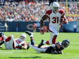 David Johnson devolvió la patada inicial 108 yardas para imponer una marca del equipo y agregó un touchdown por tierra. AP / D. Banks