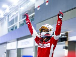 HISTÓRICO.  El alemán Sebastian Vettel (Ferrari) ganó el Gran Premio de Singapur, donde superó la tercera marca histórica de victorias EFE / D. Azubel