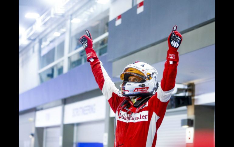 HISTÓRICO.  El alemán Sebastian Vettel (Ferrari) ganó el Gran Premio de Singapur, donde superó la tercera marca histórica de victorias EFE / D. Azubel