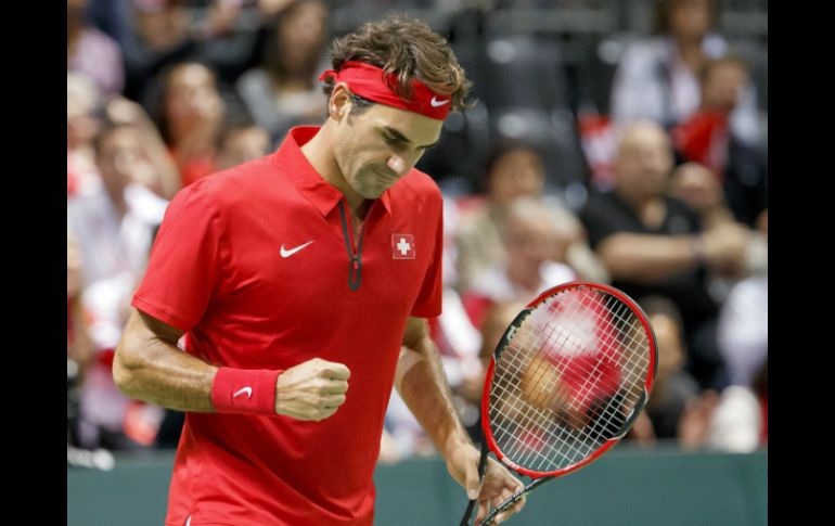 Roger Federer sabe que no puede jugar ambas competencias. EFE / S. Di Nolfi