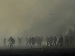 Los normalistas de Ayotzinapa han protagonizado una serie de enfrentamientos con la policía de Guerrero. AFP / Y. Cortez