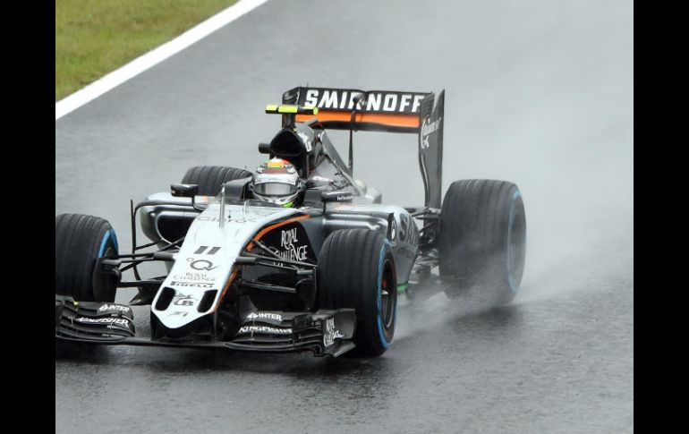 Ante la lluvia que no dejó de caer en el circuito de Suzuka, tanto Pérez como Hulkenberg se mostraron descontentos. AFP / T. Yamanaka