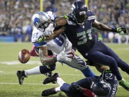 La ofensiva de Seattle comenzó a dar tumbos y perdió dos balones consecutivos en el cuarto cuarto. AP / E. Thompson