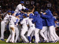 Los Cachorros aseguraron el boleto a la Serie de Campeonato con más bateo poderoso, ante una multitud delirante. AFP / J. Daniel