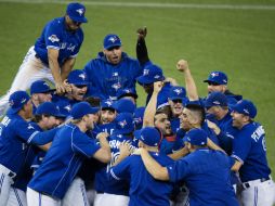 Los Azulejos de Toronto accedieron a su primera serie de Campeonato de la Liga Americana desde 1993. AP / D. Calabrese / The Canadian Press