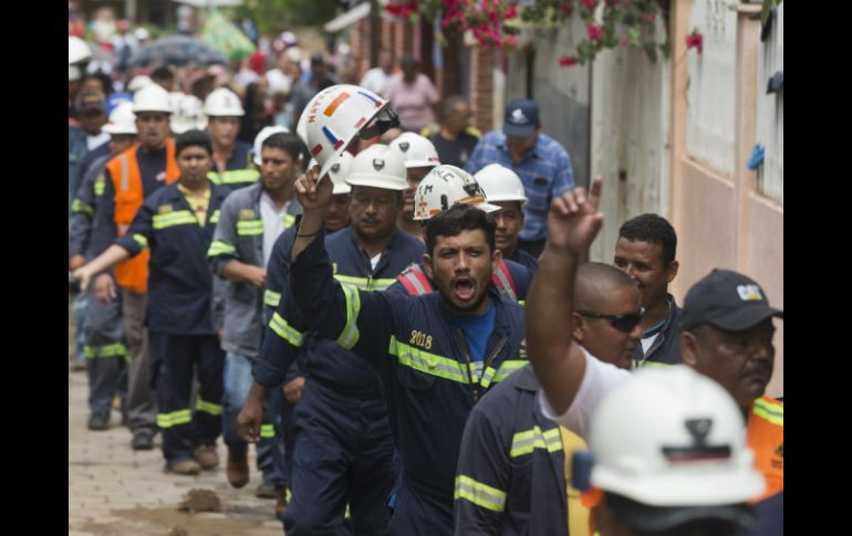 Como protesta, desde inicios de octubre los mineros decidieron cerrar el paso al yacimiento y al poblado. AP / E. Felix