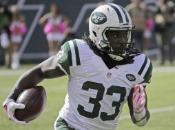 Chris Ivory corrió para 146 yardas y una anotación en 20 acarreos por los Jets. EFE / P. Foley