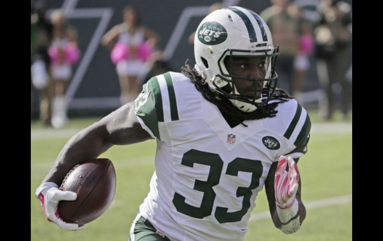 Chris Ivory corrió para 146 yardas y una anotación en 20 acarreos por los Jets. EFE / P. Foley