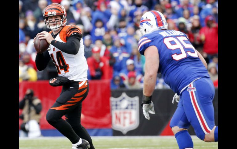 Dalton completó pases de touchdown a Marvin Jones, Tyler Eifert y Jeremy Hill. AP / B. Wippert