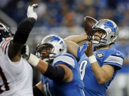 Matthew Stafford conectó un pase de 57 yardas con Calvin Johnson, dejando la mesa servida para un gol de campo. AP / D. Burleson