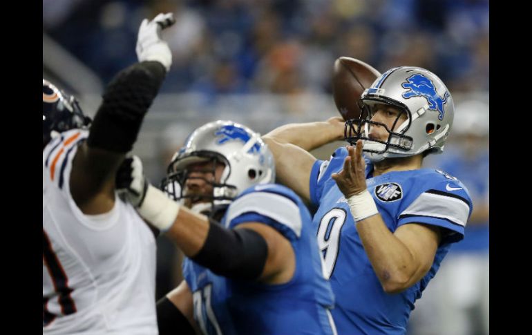 Matthew Stafford conectó un pase de 57 yardas con Calvin Johnson, dejando la mesa servida para un gol de campo. AP / D. Burleson