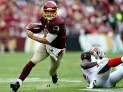 Kirk Cousins lanzó tres pases de anotación en la segunda mitad, incluido el que significó la ventaja. AFP / M. Hazlett