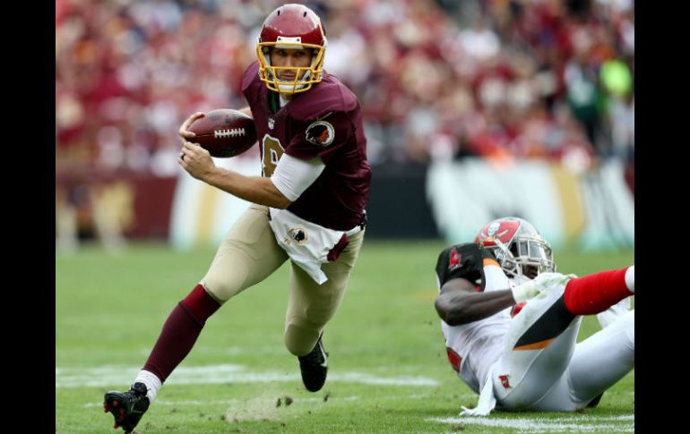 Kirk Cousins lanzó tres pases de anotación en la segunda mitad, incluido el que significó la ventaja. AFP / M. Hazlett