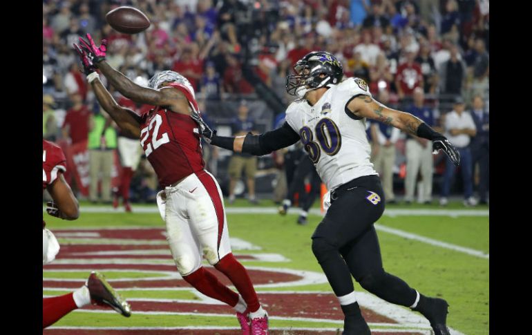 Tony Jefferson interceptó un pase en la zona de anotación para asegurar la victoria de Arizona. AP / R. Scuteri