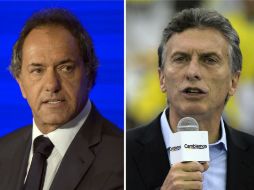 El oficialista Daniel Scioli (i) y el conservador Mauricio Macri (d) buscarán la presidencia argentina el próximo 22 de noviembre. AFP / J. Mabromata