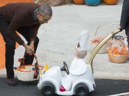 Cuando vio ese disfraz, Obama volteó hacia los periodistas y declaró 'máximo premio'. AFP / S. Loeb