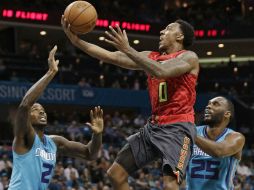 Bazemore otorgó 20 puntos a los Halcones, Teague añadió 18 y Millsap 16 más, incluido un triple crucial. AP / C. Burton