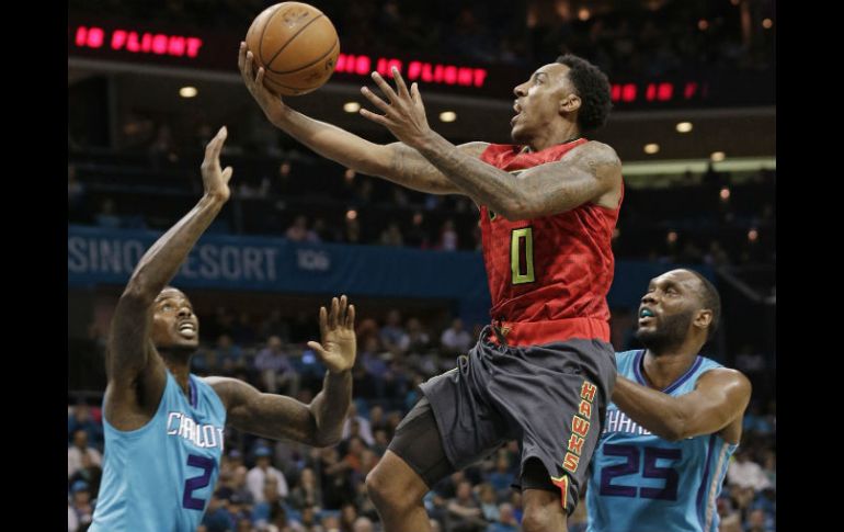 Bazemore otorgó 20 puntos a los Halcones, Teague añadió 18 y Millsap 16 más, incluido un triple crucial. AP / C. Burton