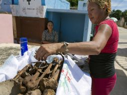 Para los habitantes de Pomuch, Campeche, esta tradición es normal y en absoluto significa profanación. NTX / ARCHIVO