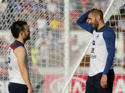 El atacante del Real Madrid habló con Valbuena durante una concentración de la Selección francesa. AP / ARCHIVO