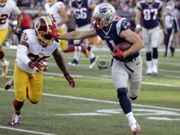 Julian Edelman (foto) y LeGarrette Blount anotaron antes de que los Pieles Rojas realizaran siquiera su segunda jugada ofensiva. AP / S. Senne