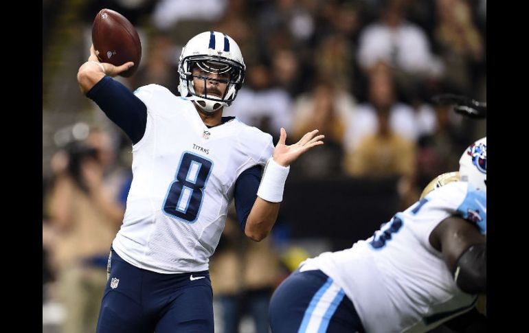 El novato Marcus Mariota lanzó cuatro pases de touchdowns, incluyendo el decisivo. AFP / S. Revere