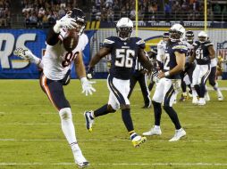 Zach Miller, ala cerrada de Chicago, capturó a una mano el pase que culminó en el tochdown de la victoria. AP / L. Ignelzi