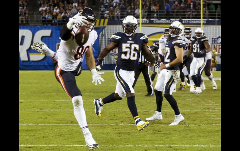 Zach Miller, ala cerrada de Chicago, capturó a una mano el pase que culminó en el tochdown de la victoria. AP / L. Ignelzi