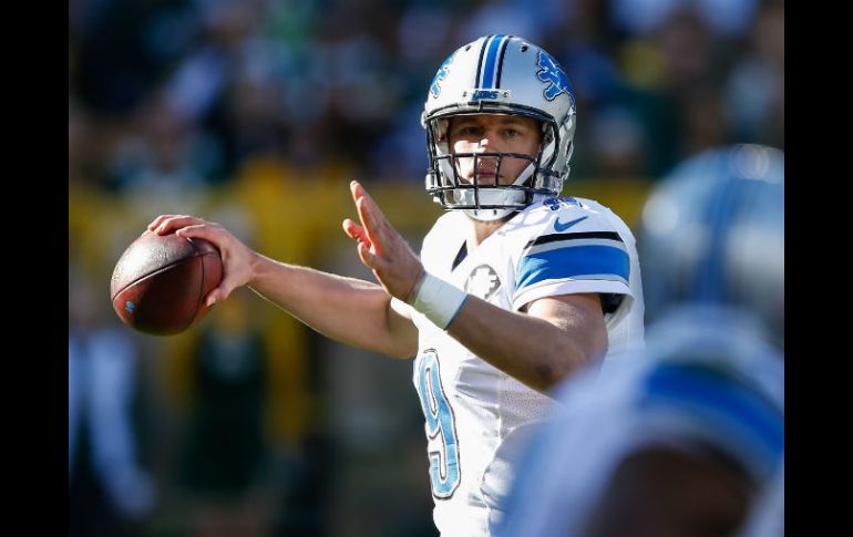 Matthew Stafford lanzó para dos anotaciones. AFP / J. Robbins