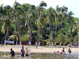 La playa de Tenacatita es liberada completamente, y desde ayer se cuenta con acceso libre a cualquiera que lo desee. EL INFORMADOR / ARCHIVO