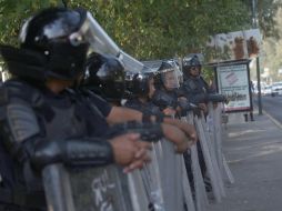 Al menos dos mil elementos de la Policía Federal se han retirado de los cuatro mil que resguardaban la sede. SUN / ARCHIVO