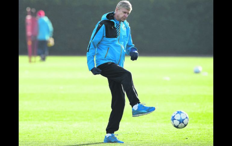 Con esperanzas. Arsene Wenger aseguró: “Daremos todo lo que tenemos por seguir”. AFP / A. Dennis