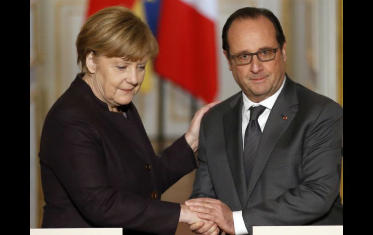 Merkel y Hollande también repasarán preparativos para cumbre sobre cambio climático. AP / F. Mori