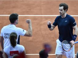 Este sábado se disputará el punto por parejas con Darcis al lado de Coppejans contra los hermanos  Andy (derecha) y Jamie Murray. AFP / P. Huguen