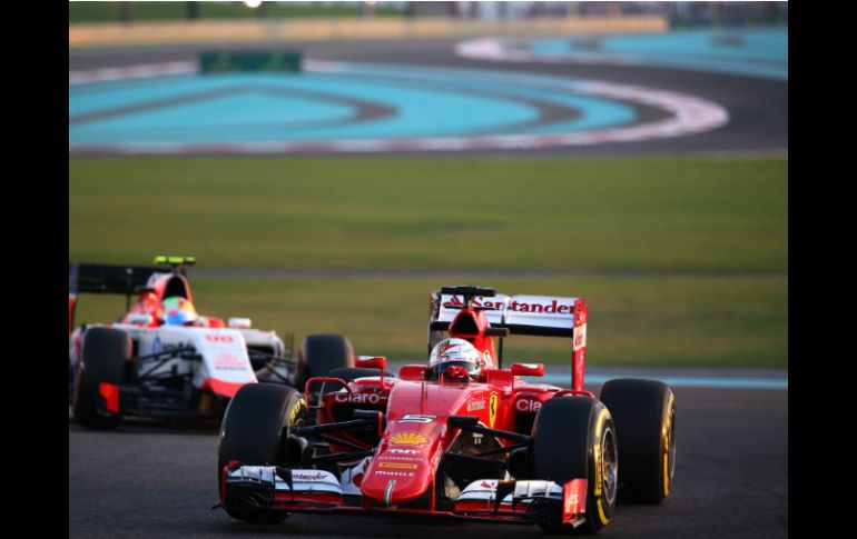 El alemán Sebastian Vettel (Ferrari) ocupa la decimosexta posición en la tabla de tiempos. AFP / M. Naamani