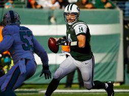 Ryan Fitzpatrick lanzó cuatro pases de touchdown. AFP / A. Bello