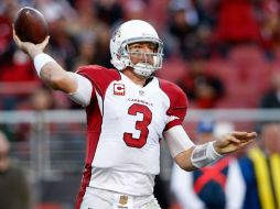 Carson Palmer anotó un touchdown al acarrear ocho yardas con el balón cuando restaban 2:28 por jugar. AFP / E. Shaw