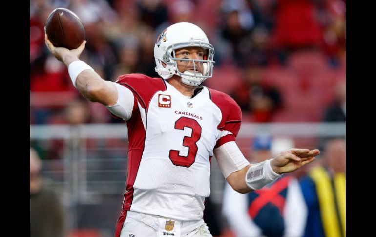 Carson Palmer anotó un touchdown al acarrear ocho yardas con el balón cuando restaban 2:28 por jugar. AFP / E. Shaw