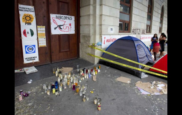 La dirigente de la CETEG, que mantiene un plantón en el zócalo de Chilpancingo, informa que saldrán por la madrugada. AP / ARCHIVO