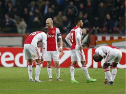 Los jugadores del Ajax fueron presa de la desilusión tras quedar eliminados en la Europa League. AP / P. Dejong