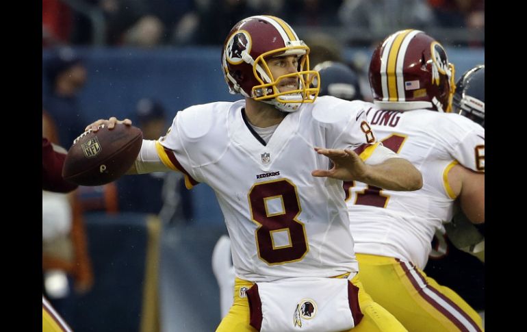 Kirk Cousins lanzó para 300 yardas y un touchdown el domingo. AP / N. Y. Huh