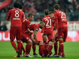 El equipo dio un paso más en su objetivo de lograr el triplete, una vez clasificado a los octavos de final de la Liga de Campeones. AFP / C. Stache