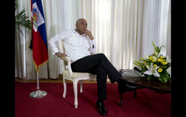 El presidente Martelly anunció que una comisión especial investigaría las elecciones, la oposición ha rechazado a los integrantes. AP / D. Nalio