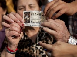 La tradición del Sorteo de Navidad cada 22 de diciembre es una de las más esperadas por los españoles. AFP / J. Guerrero