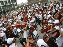 Violines, flautas, violonchelos, entre otros instrumentos fueron tocados por jóvenes de entre seis y 25 años. EFE / J. Mazzoni