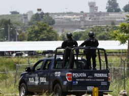 Alrededor de 200 elementos policiacos participan en el operativo. AFP / H. Guerrero