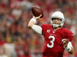 Carson Palmer lanzó para generar 257 yardas y dos anotaciones por Arizona. AFP / C. Petersen